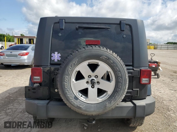 2007 Jeep Wrangler Unlimited Sahara with VIN 1J4GA59197L121262, listed as a Copart auction lot 61551685 with 233,309 mi miles and Clean title. Bid and sale history available at DreamBid. Image 6.