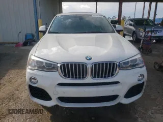 2015 BMW X4 xDrive35i with VIN 5UXXW5C51F0E87978, listed as a Copart auction lot 77793773 with 96,152 mi miles. Bid and sale history available at carsss.com. Image 5.