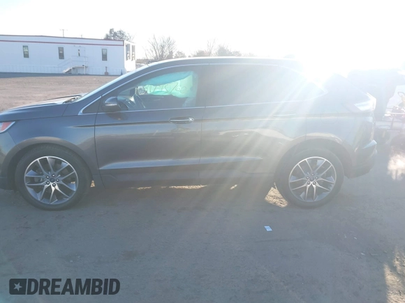 2015 Ford Edge Titanium with VIN 2FMPK4K87FBB77277, listed as a IAAI auction lot 41795760 with 164,844 mi miles. Bid and sale history available at carsss.com. Image 14.