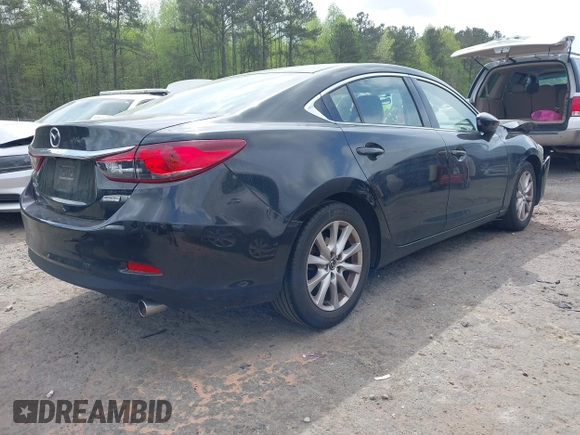 2016 Mazda 6 i Sport with VIN JM1GJ1U55G1461951, listed as a IAAI auction lot 41790268 with 98,567 mi miles and . Bid and sale history available at DreamBid. Image 4.