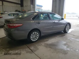 2015 Toyota Camry LE z VIN 4T1BD1FK1FU172465, wystawiony jako Copart lot #60708715 z przebiegiem 217 544 mil mil oraz Czysty tytuł • Clean title. Historia ofert i sprzedaży dostępna na DreamBid. Obrazek 3.