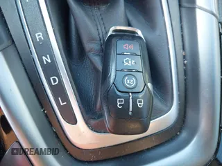 2016 Ford Fusion Titanium Hybrid with VIN 3FA6P0RU1GR259947, listed as a IAAI auction lot 41695377 with 97,605 mi miles. Bid and sale history available at carsss.com. Image 11.