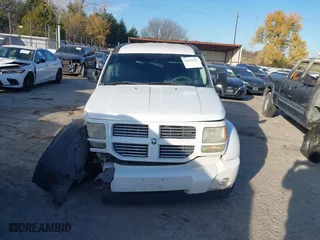 2011 Dodge Nitro Heat with VIN 1D4PT4GK0BW582589, listed as a IAAI auction lot 41015035 with 130,098 mi miles. Bid and sale history available at carsss.com. Image 13.