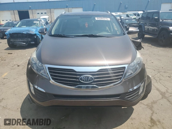 2011 Kia Sportage EX z VIN KNDPCCA27B7101294, wystawiony jako Copart lot #64284315 z przebiegiem 82 592 mil mil oraz Czysty tytuł • Clean title. Historia ofert i sprzedaży dostępna na DreamBid. Obrazek 5.