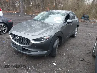 2021 Mazda CX-30 Select with VIN 3MVDMBBL2MM312752, listed as a IAAI auction lot 41933342 with 52,213 mi miles and . Bid and sale history available at DreamBid. Image 18.