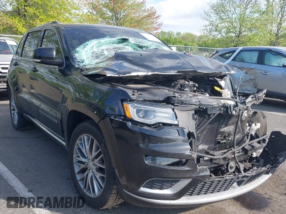 2018 Jeep Grand Cherokee Summit with VIN 1C4RJFJT5JC120523, listed as a IAAI auction lot 42136651 with 75,699 mi miles and . Bid and sale history available at DreamBid. Image 1.