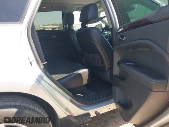 2015 Cadillac SRX Luxury Collection with VIN 3GYFNBE38FS576165, listed as a IAAI auction lot 41974066 with 95,832 mi miles. Bid and sale history available at carsss.com. Image 8.