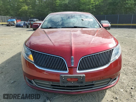 2015 Lincoln MKS with VIN 1LNHL9DK5FG607422, listed as a Copart auction lot 55613525 with 164,590 mi miles and Salvage title. Bid and sale history available at DreamBid. Image 5.