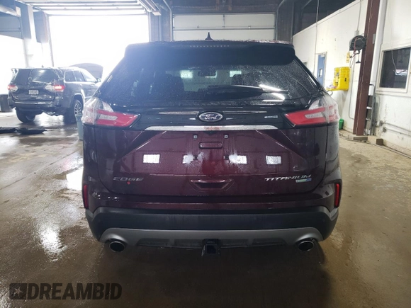 2020 Ford Edge Titanium z VIN 2FMPK4K9XLBA59857, wystawiony jako Copart lot #63559295 z przebiegiem Nie podano mil oraz Szkoda całkowita • Salvage title. Historia ofert i sprzedaży dostępna na DreamBid. Obrazek 6.