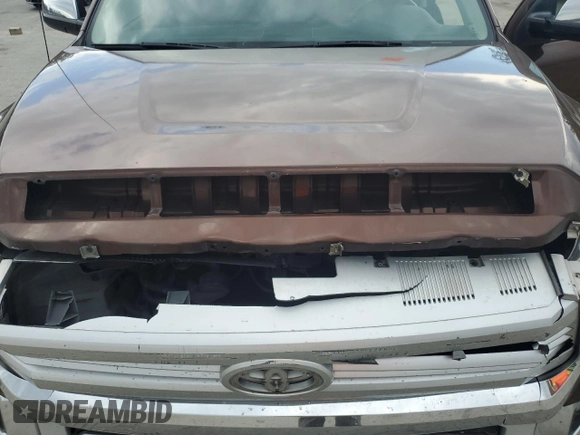 2015 Toyota Tundra Platinum z VIN 5TFGY5F15FX190172, wystawiony jako Copart lot #70645734 z przebiegiem 265 516 mil mil oraz Szkoda całkowita • Salvage title. Historia ofert i sprzedaży dostępna na DreamBid. Obrazek 11.