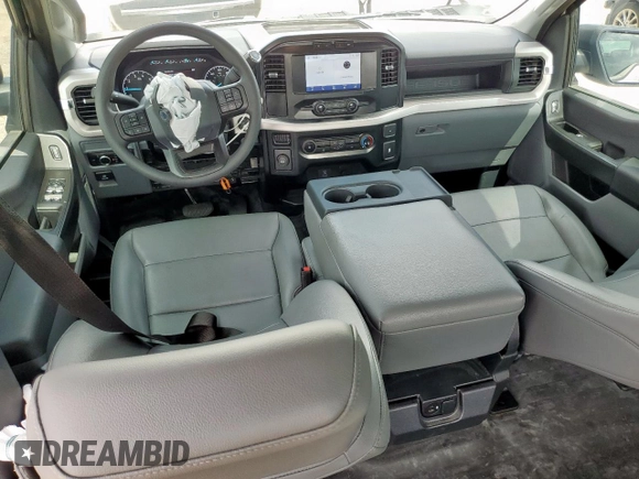 2023 Ford F-150 XL с VIN 1FTEW1CP9PKG21142, выставлен на аукционе Copart как лот 63073825 с пробегом 18 539 миль миль и Списание • Salvage title. История ставок и продаж доступна на DreamBid. Изображение 8.