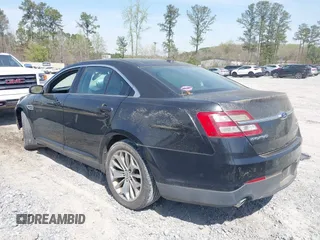 2014 Ford Taurus Limited with VIN 1FAHP2F80EG105147, listed as a IAAI auction lot 41899174 with 137,451 mi miles and . Bid and sale history available at DreamBid. Image 3.
