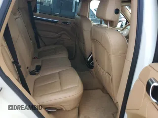 2012 Porsche Cayenne with VIN WP1AA2A23CLA02615, listed as a Copart auction lot 64604655 with 131,536 mi miles and Salvage title. Bid and sale history available at DreamBid. Image 11.