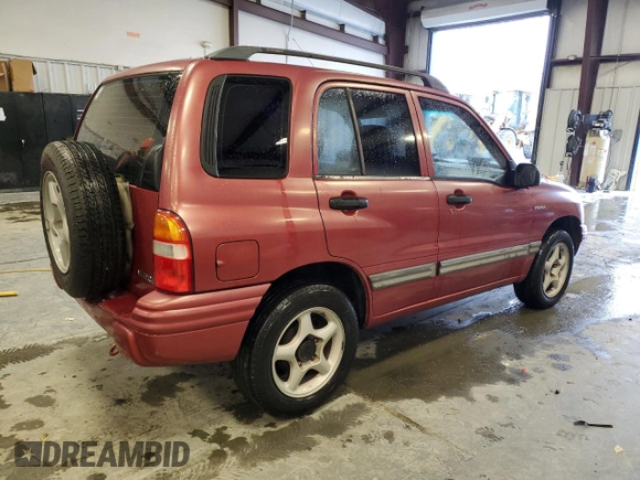 1999 Suzuki Vitara JLS z VIN 2S3TE52V6X6110719, wystawiony jako Copart lot #44219825 z przebiegiem 190 311 mil mil oraz Szkoda całkowita • Salvage title. Historia ofert i sprzedaży dostępna na DreamBid. Obrazek 3.