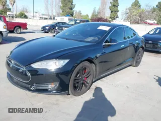 2014 Tesla Model S P85D with VIN 5YJSA1H22EFP65530, listed as a IAAI auction lot 41959941 with 76,532 mi miles and . Bid and sale history available at DreamBid. Image 19.