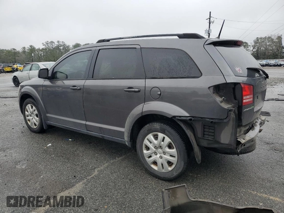 2018 Dodge Journey SE with VIN 3C4PDCAB6JT517988, listed as a Copart auction lot 48103275 with 129,897 mi miles and Salvage Title. Bid and sale history available at DreamBid. Image 2.