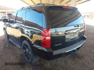 2007 Chevrolet Tahoe LS with VIN 1GNFC13C07J400472, listed as a IAAI auction lot 42209311 with 212,924 mi miles and . Bid and sale history available at DreamBid. Image 3.