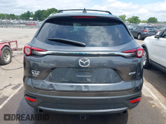 2019 Mazda CX-9 Touring with VIN JM3TCACY6K0334085, listed as a IAAI auction lot 42391595 with 113,723 mi miles and . Bid and sale history available at DreamBid. Image 16.