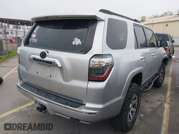 2010 Toyota 4Runner Trail with VIN JTEBU5JR3A5020489, listed as a IAAI auction lot 41255556 with 231,856 mi miles and . Bid and sale history available at DreamBid. Image 4.