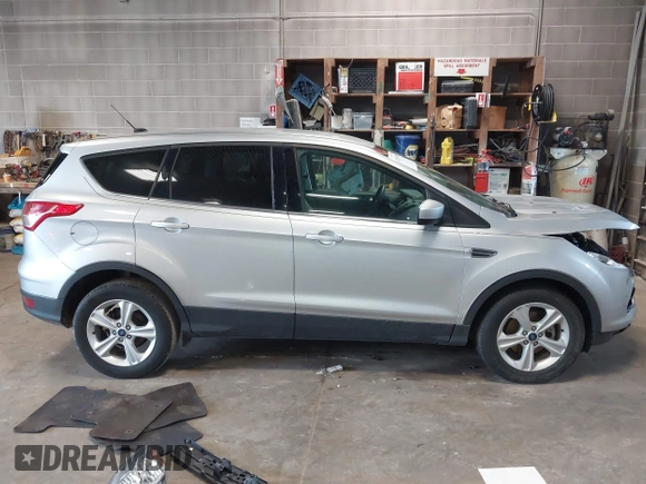 2015 Ford Escape SE with VIN 1FMCU0GX4FUC22042, listed as a IAAI auction lot 42094798 with 35,407 mi miles and . Bid and sale history available at DreamBid. Image 14.