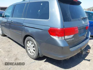 2010 Honda Odyssey EX-L with VIN 5FNRL3H7XAB061280, listed as a IAAI auction lot 41979790 with 245,386 mi miles. Bid and sale history available at carsss.com. Image 3.