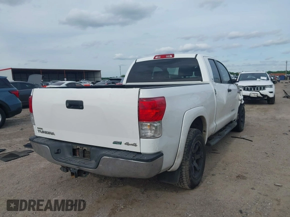 2012 Toyota Tundra with VIN 5TFUW5F16CX225421, listed as a IAAI auction lot 42210783 with 207,025 mi miles and . Bid and sale history available at DreamBid. Image 4.