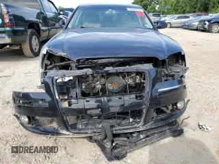 2009 Audi A8 L 4.2L with VIN WAUMV94E69N001082, listed as a Copart auction lot 70003814 with 88,490 mi miles and Clean Title. Bid and sale history available at carsss.com. Image 5.
