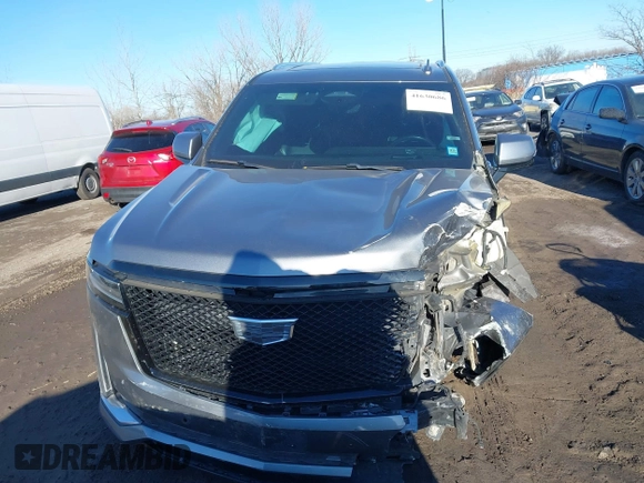 2021 Cadillac Escalade Premium Luxury z VIN 1GYS4CKL2MR231788, wystawiony jako IAAI lot #41630686 z przebiegiem 56 672 mil mil oraz . Historia ofert i sprzedaży dostępna na DreamBid. Obrazek 12.