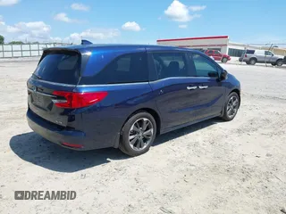 2024 Honda Odyssey Elite z VIN 5FNRL6H97RB057976, wystawiony jako IAAI lot #42428910 z przebiegiem 13 021 mil mil oraz . Historia ofert i sprzedaży dostępna na DreamBid. Obrazek 4.