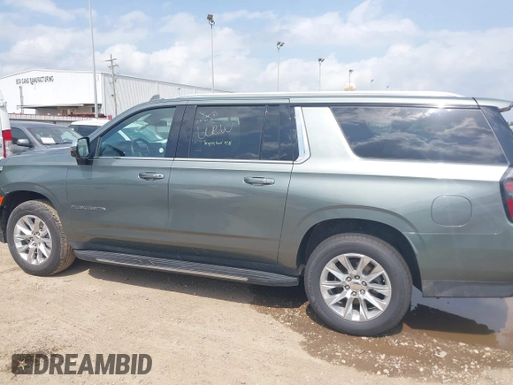 2023 Chevrolet Suburban Premier with VIN 1GNSCFKD6PR393843, listed as a IAAI auction lot 42101935 with 59,604 mi miles. Bid and sale history available at carsss.com. Image 14.
