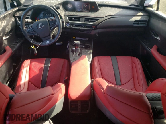 2022 Lexus UX 250h F Sport with VIN JTHE9JBHXN2057983, listed as a Copart auction lot 71456654 with 27,367 mi miles and Salvage Title. Bid and sale history available at DreamBid. Image 8.