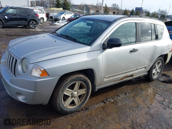 2008 Jeep Compass Sport with VIN 1J8FF47W58D703312, listed as a IAAI auction lot 41693818 with 156,161 mi miles. Bid and sale history available at carsss.com. Image 2.