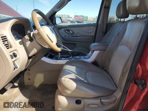 2005 Mercury Mariner Luxury with VIN 4M2YU57105DJ18837, listed as a Copart auction lot 52105545 with 177,049 mi miles and Salvage title. Bid and sale history available at DreamBid. Image 7.