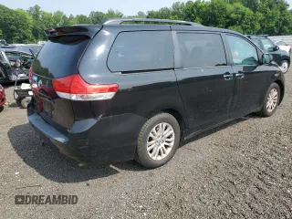 2013 Toyota Sienna XLE AAS with VIN 5TDYK3DCXDS333750, listed as a Copart auction lot 60894295 with 154,400 mi miles and Salvage title. Bid and sale history available at DreamBid. Image 3.