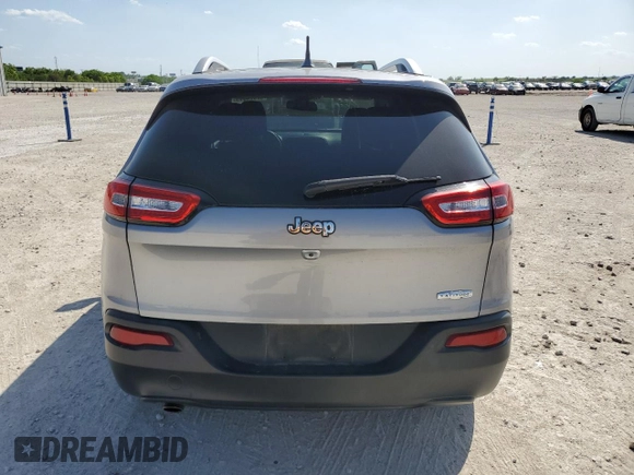 2016 Jeep Cherokee 75th Anniversary with VIN 1C4PJLCBXGW149100, listed as a Copart auction lot 52574015 with 96,308 mi miles and Salvage Title. Bid and sale history available at carsss.com. Image 6.