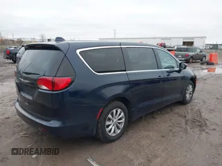 2017 Chrysler Pacifica Touring with VIN 2C4RC1DG3HR592796, listed as a IAAI auction lot 40941158 with 157,291 mi miles and . Bid and sale history available at DreamBid. Image 4.