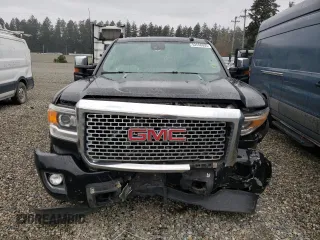 2016 GMC Sierra 3500HD Denali z VIN 1GT42YE82GF140938, wystawiony jako Copart lot #52556095 z przebiegiem 136 654 mil mil oraz Szkoda całkowita • Salvage title. Historia ofert i sprzedaży dostępna na DreamBid. Obrazek 5.