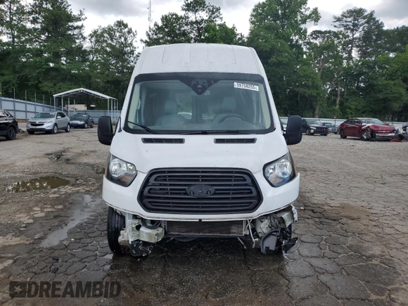2016 Ford Transit Cargo z VIN 1FTYR3XM3GKB43476, wystawiony jako Copart lot #59758255 z przebiegiem 142 943 mil mil oraz Szkoda całkowita • Salvage title. Historia ofert i sprzedaży dostępna na DreamBid. Obrazek 5.