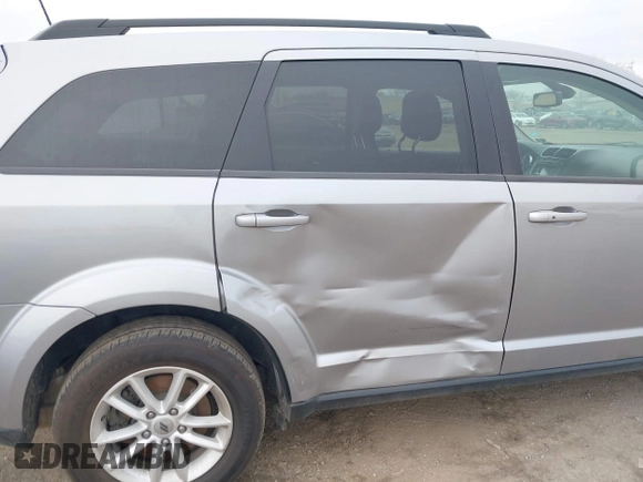 2019 Dodge Journey SE with VIN 3C4PDCBBXKT810874, listed as a IAAI auction lot 41960889 with 170,441 mi miles and . Bid and sale history available at DreamBid. Image 6.