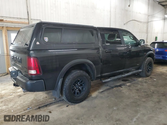 2018 Ram 1500 Rebel with VIN 1C6RR7YT3JS128802, listed as a Copart auction lot 50512365 with 98,106 mi miles and Salvage title. Bid and sale history available at DreamBid. Image 3.