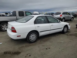 1994 Honda Accord LX w/ABS with VIN JHMCD563XRC101038, listed as a Copart auction lot 82127974 with 229,122 mi miles and Salvage Title. Bid and sale history available at carsss.com. Image 3.