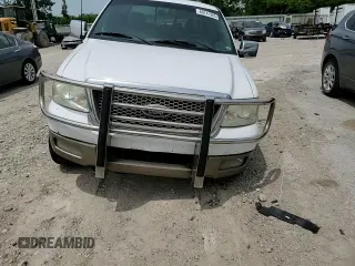 2004 Ford F-150 XLT with VIN 1FTPW14554KC27784, listed as a Copart auction lot 60741985 with 3,163 mi miles and Salvage title. Bid and sale history available at DreamBid. Image 13.