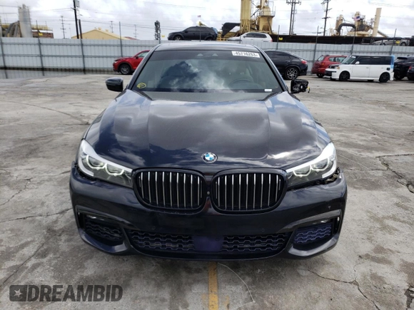 2016 BMW 7 Series 740i with VIN WBA7E2C54GG548312, listed as a Copart auction lot 45716263 with 74,249 mi miles. Bid and sale history available at carsss.com. Image 5.