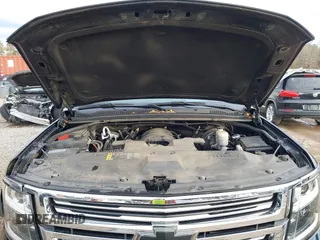 2020 Chevrolet Suburban Premier with VIN 1GNSCJKC0LR121728, listed as a IAAI auction lot 41105003 with 43,820 mi miles and . Bid and sale history available at DreamBid. Image 10.