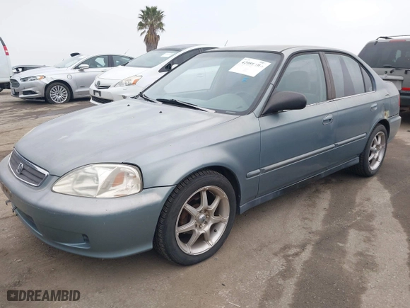 2000 Honda Civic VP with VIN 2HGEJ6613YH573635, listed as a IAAI auction lot 42099695 with 235,772 mi miles. Bid and sale history available at carsss.com. Image 2.