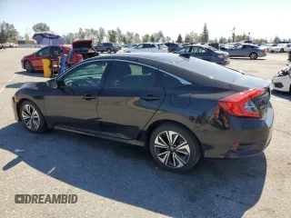 2016 Honda Civic Sedan EX-L with VIN 2HGFC1F74GH649190, listed as a Copart auction lot 50448425 with 73,667 mi miles and Salvage Title. Bid and sale history available at carsss.com. Image 2.