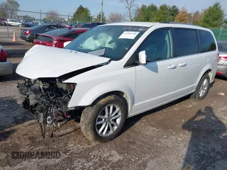 2019 Dodge Grand Caravan SXT with VIN 2C4RDGCG5KR758521, listed as a IAAI auction lot 41902760 with 133,994 mi miles and . Bid and sale history available at DreamBid. Image 2.