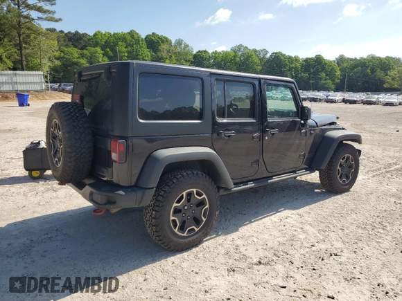 2016 Jeep Wrangler Unlimited Rubicon Hard Rock z VIN 1C4BJWFG6GL125252, wystawiony jako Copart lot #55241115 z przebiegiem 193 554 mil mil oraz Szkoda całkowita • Salvage title. Historia ofert i sprzedaży dostępna na DreamBid. Obrazek 3.
