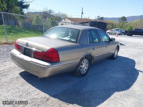 2004 Mercury Grand Marquis LS Premium with VIN 2MEFM75W44X656311, listed as a IAAI auction lot 41998194 with 289,710 mi miles. Bid and sale history available at carsss.com. Image 4.