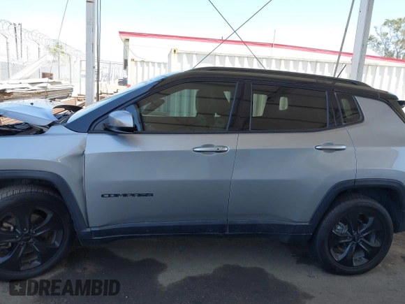 2019 Jeep Compass Latitude with VIN 3C4NJDBB4KT754484, listed as a IAAI auction lot 42324284 with 85,637 mi miles and . Bid and sale history available at DreamBid. Image 14.